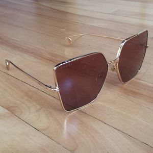 Red Gucci sunglasses